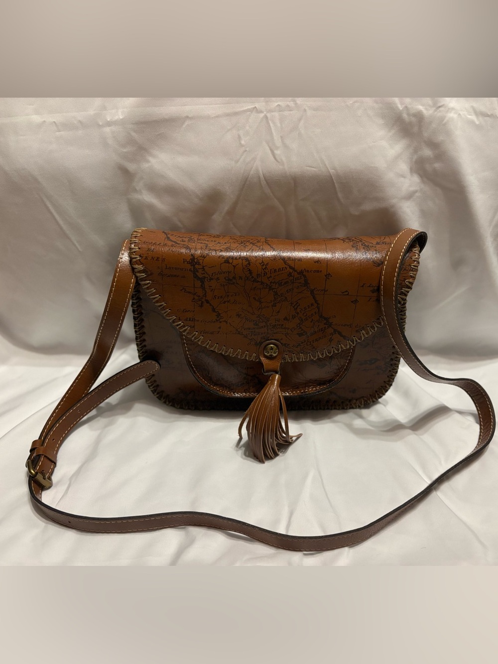 Patricia Nash Like Nee Brown Map-Print Leather Crossbody Bag with Tassel